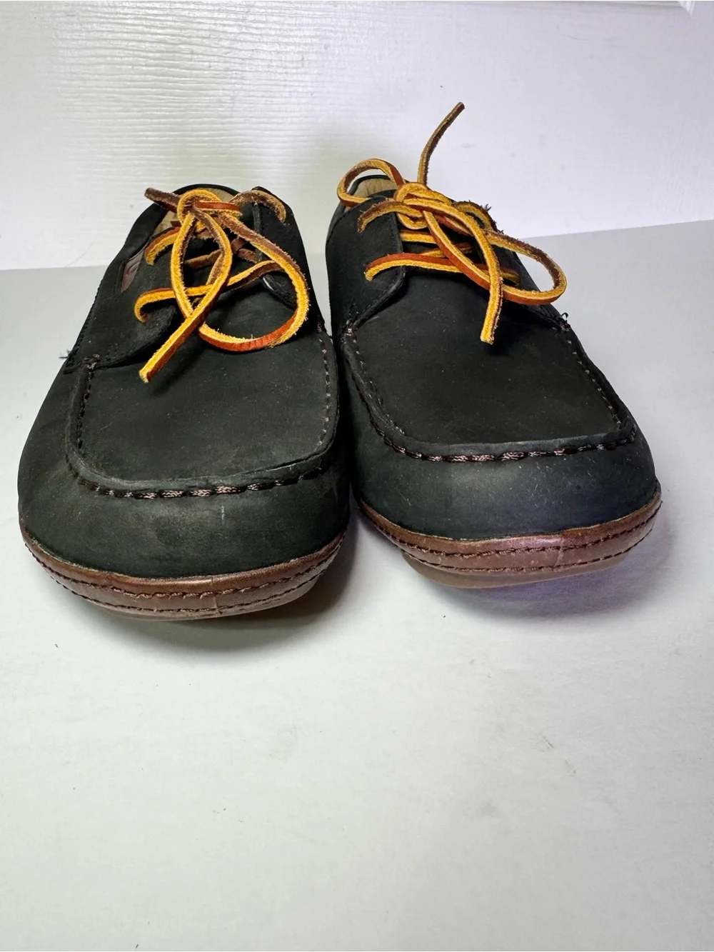 OluKai Black and Brown Leather Boat Moccasins with Tan Laces